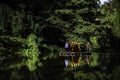 Monks come to offer alms by coming through the water by punting on bamboo rafts along the river at O Ã¢â¬â¹Ã¢â¬â¹Poi Market